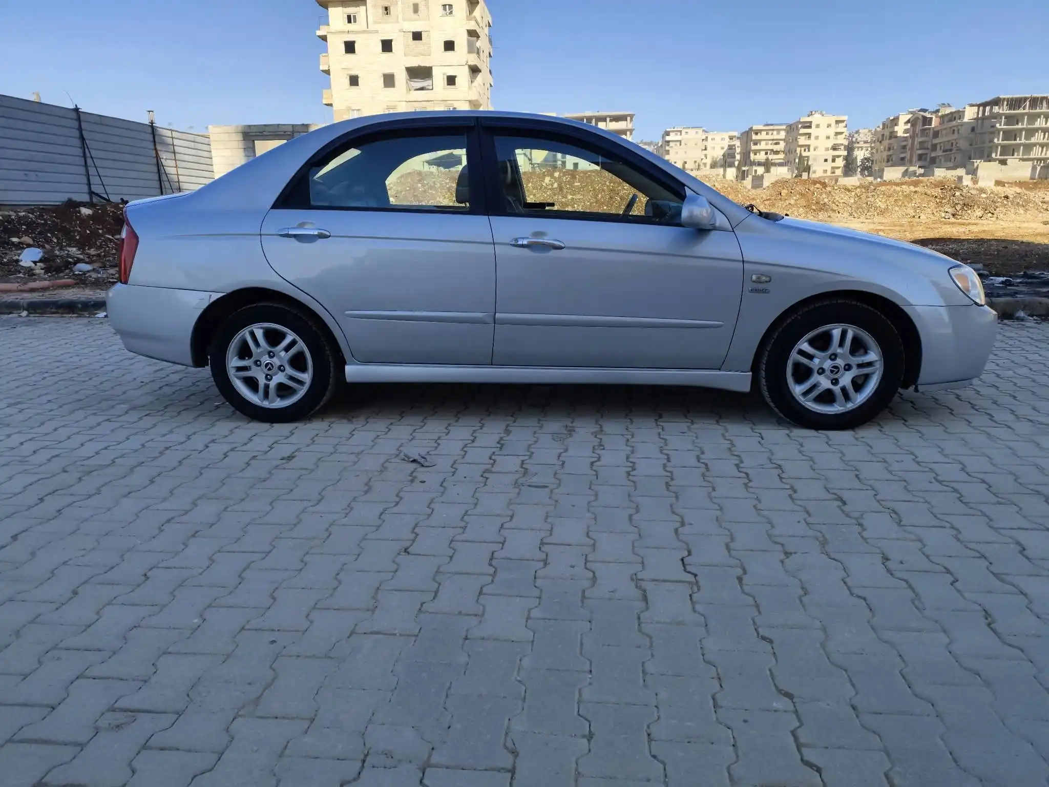 kilometrage car sale kia cerato standard sedan used 2005 aleppo kw image