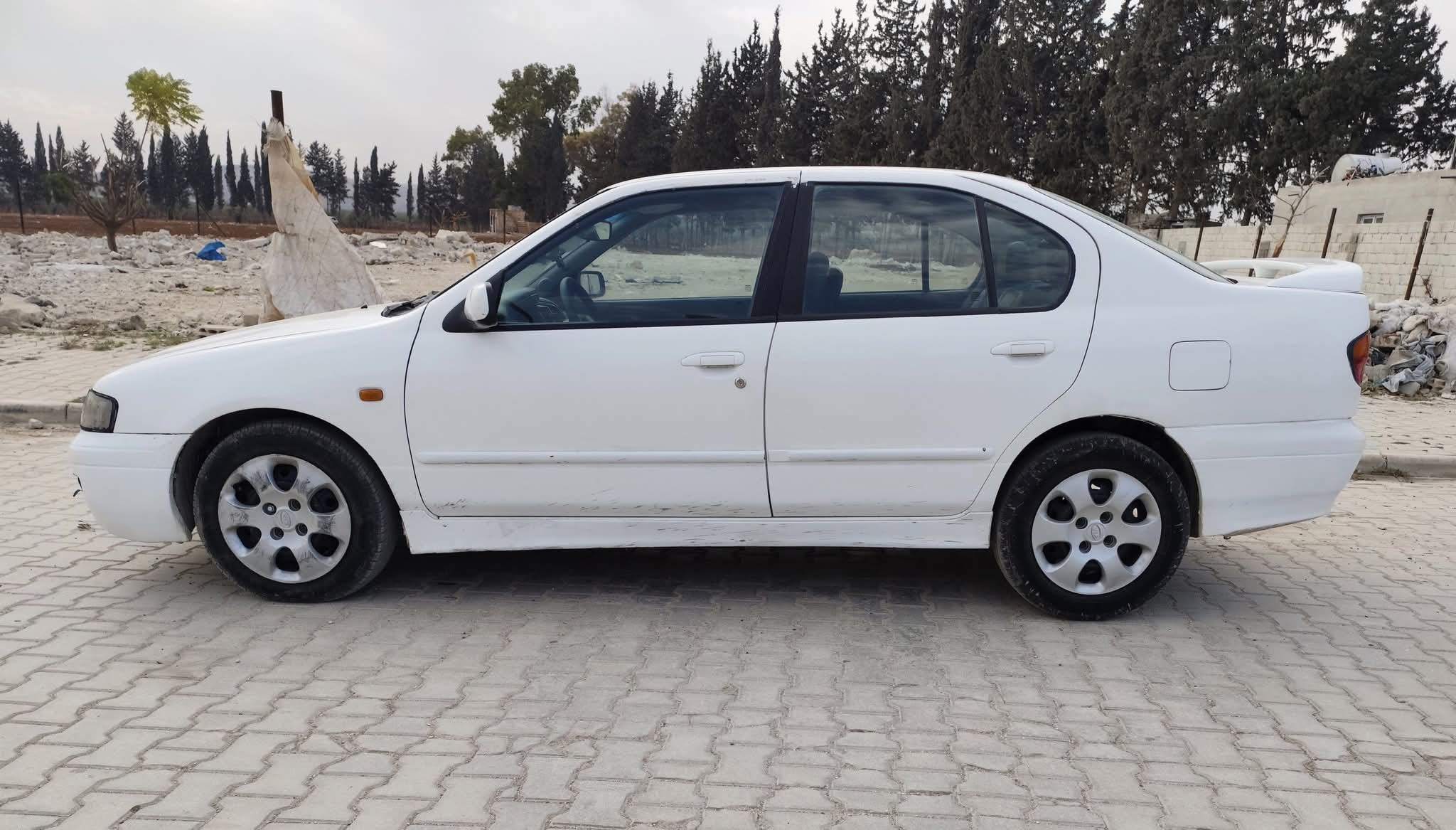 kilometrage car sale nissan primera standard sedan used 2001 aleppo zj image