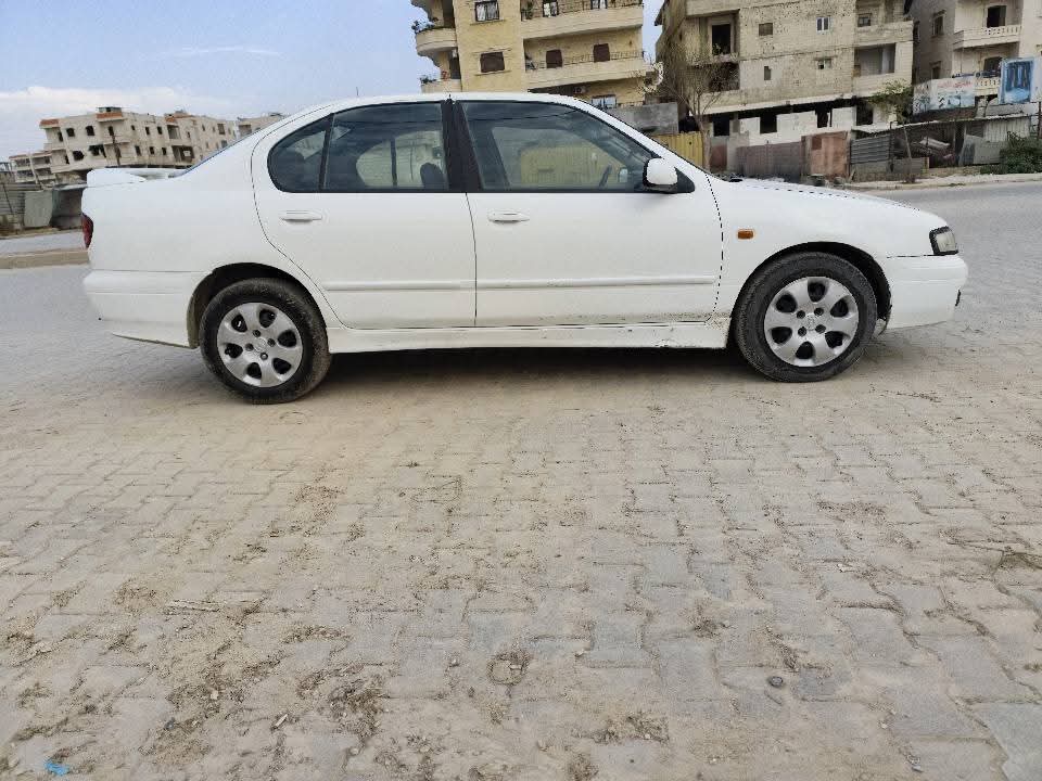 kilometrage car sale nissan primera standard sedan used 2001 aleppo zj image