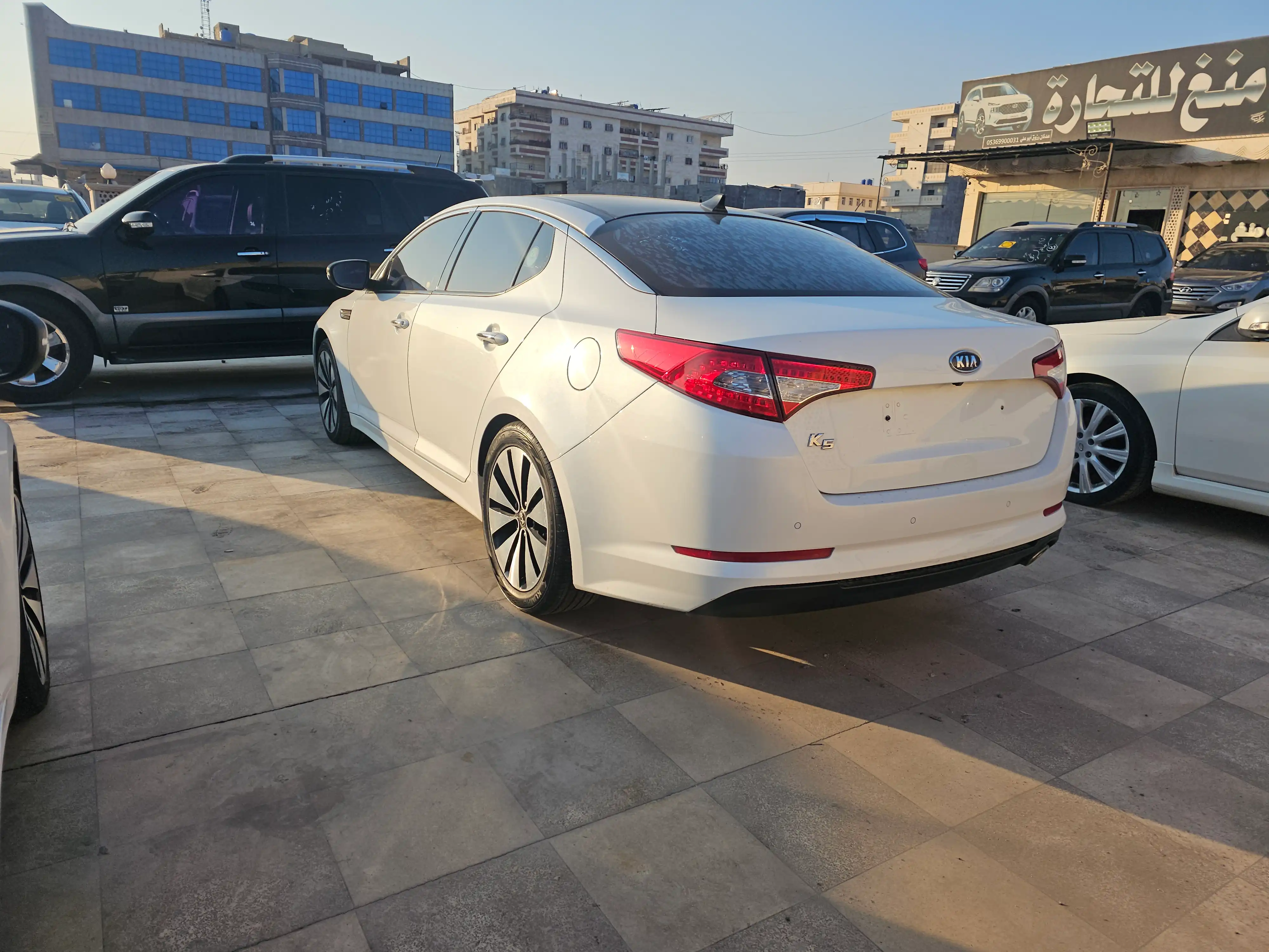 kilometrage car sale kia k5 standard sedan used 2011 aleppo pr image