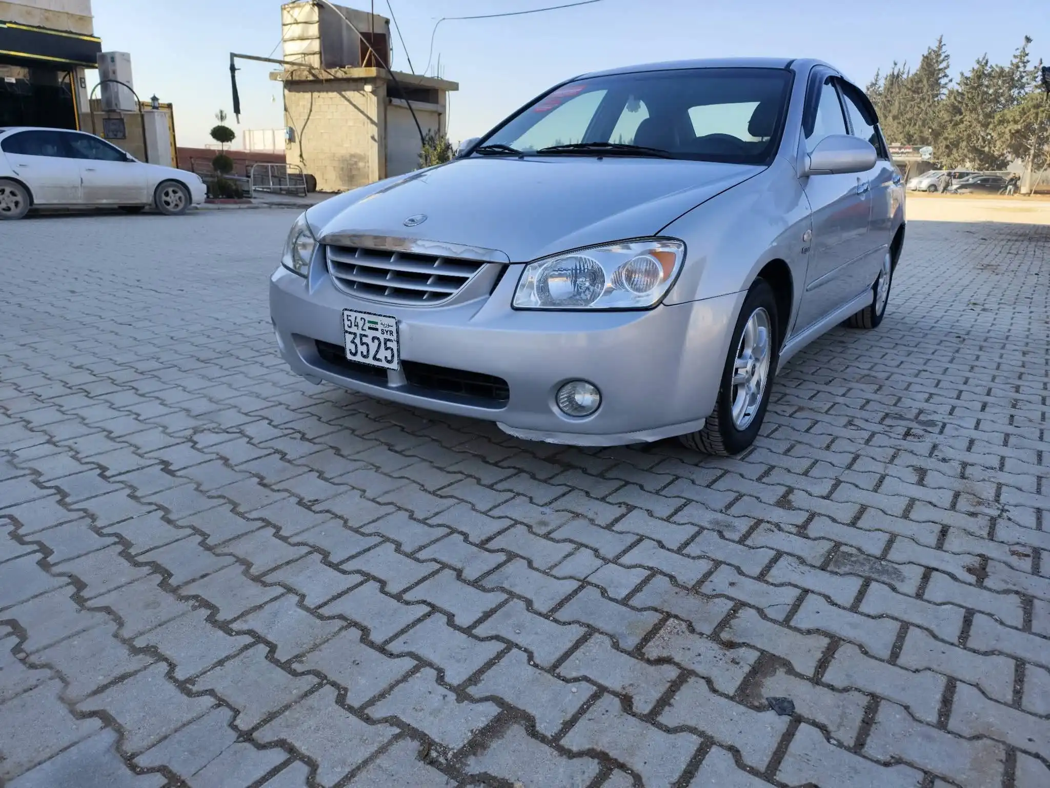 kilometrage car sale kia cerato standard sedan used 2005 aleppo kw card image