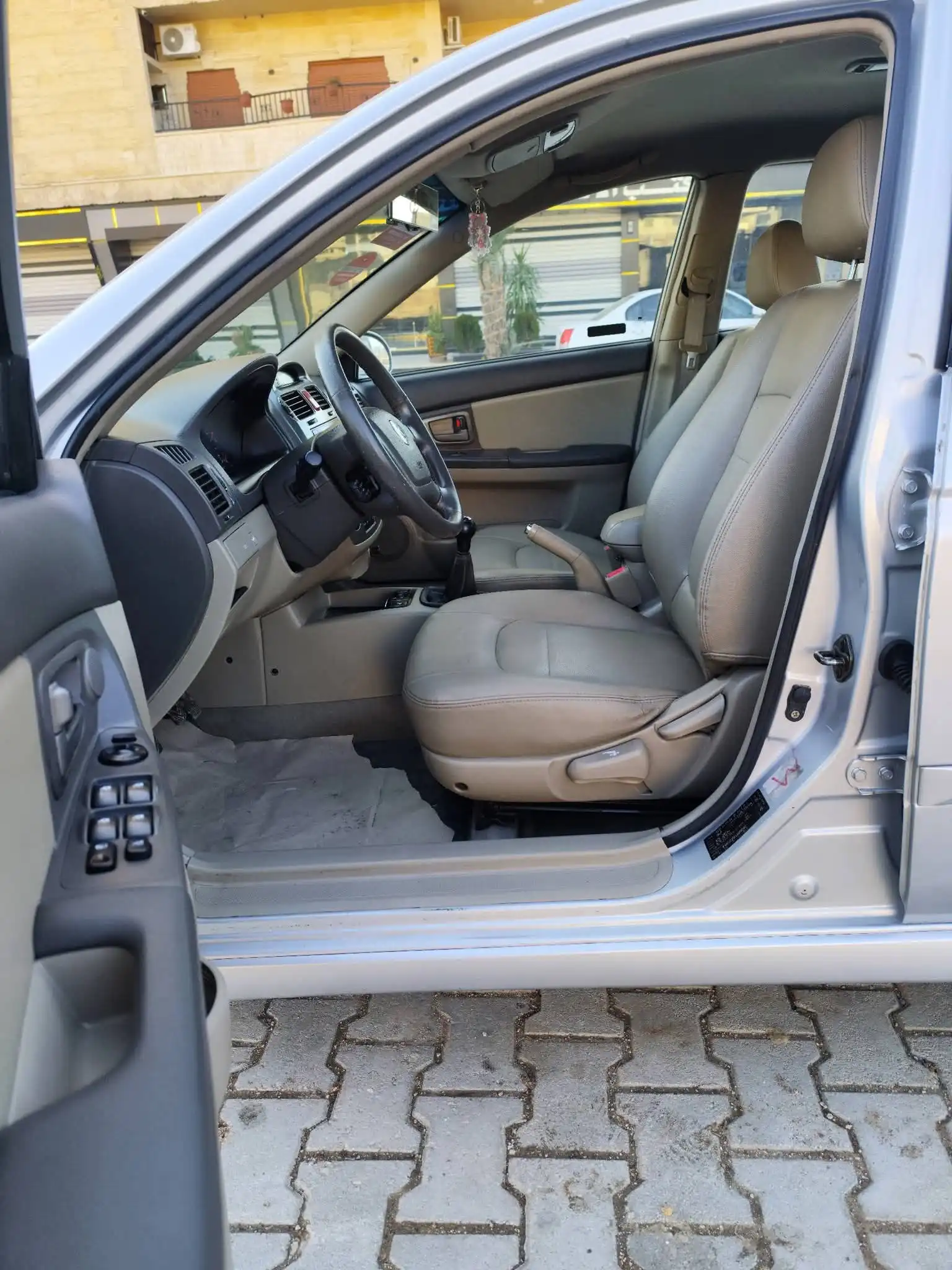 kilometrage car sale kia cerato standard sedan used 2005 aleppo kw image